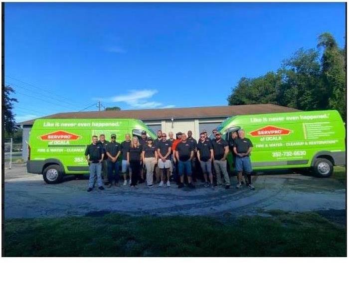 SERVPRO of East Gainesville Team standing in front of vans
